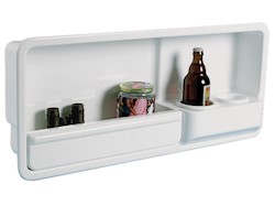 Vano laterale portaoggetti provvisto di due portabicchieri /lattine/ piccole bottiglie